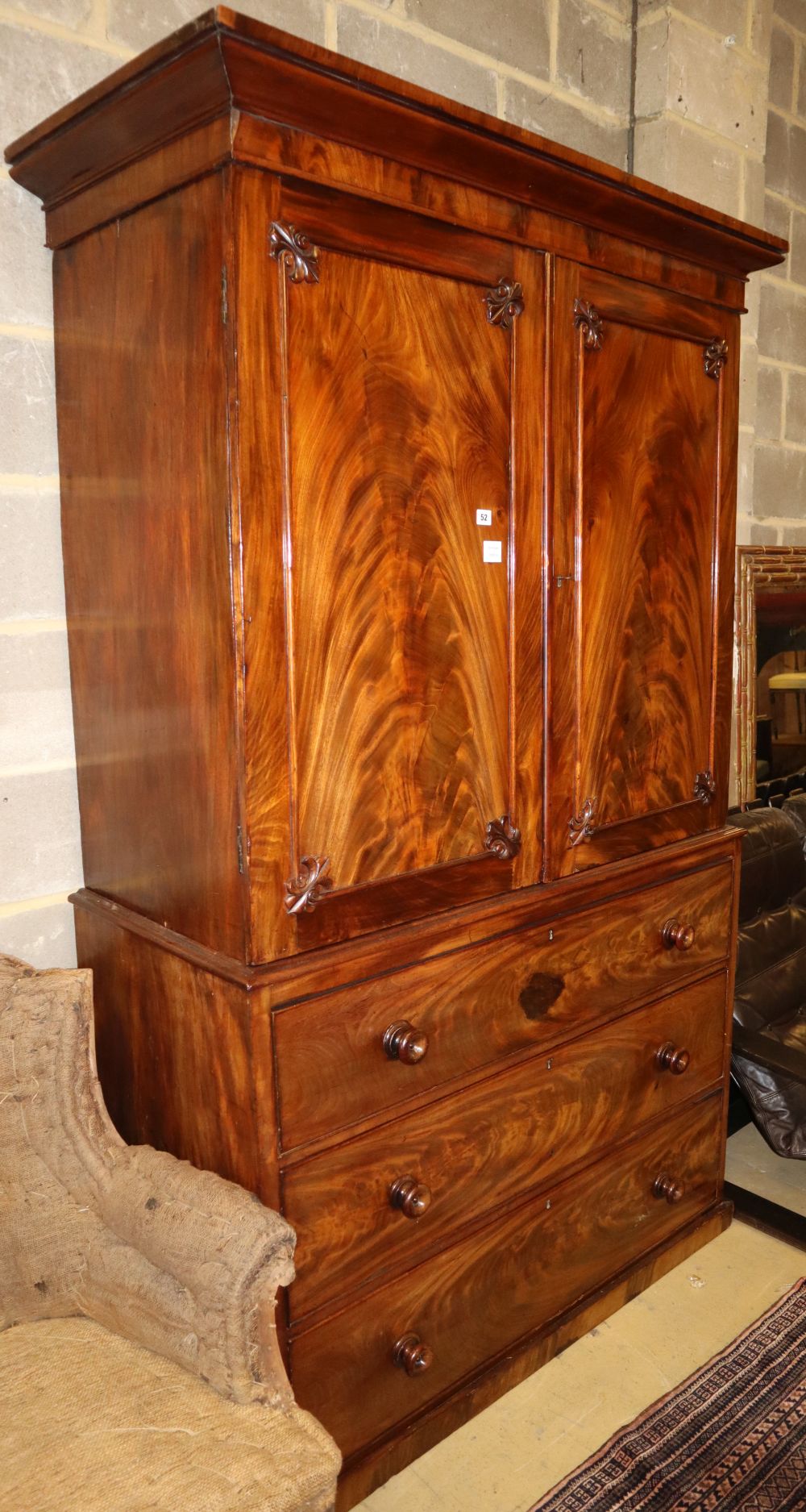 An early Victorian mahogany linen press, W.129cm, D.60cm, H.210cm